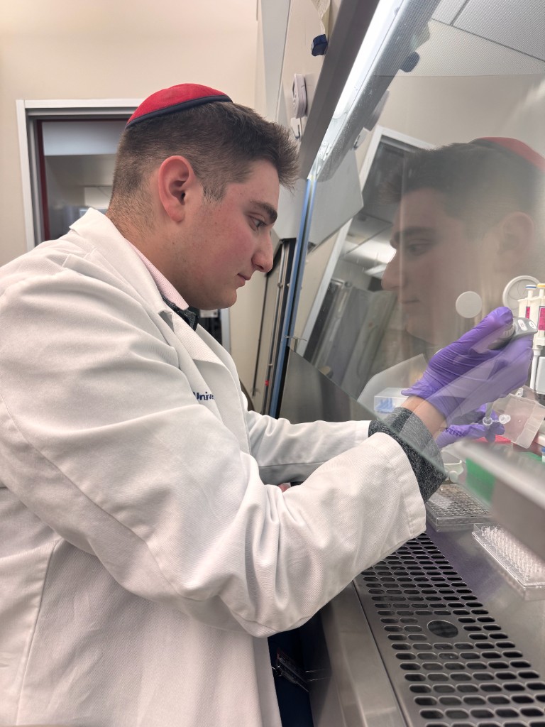 Summer student conducting laboratory research in the Shoag Lab